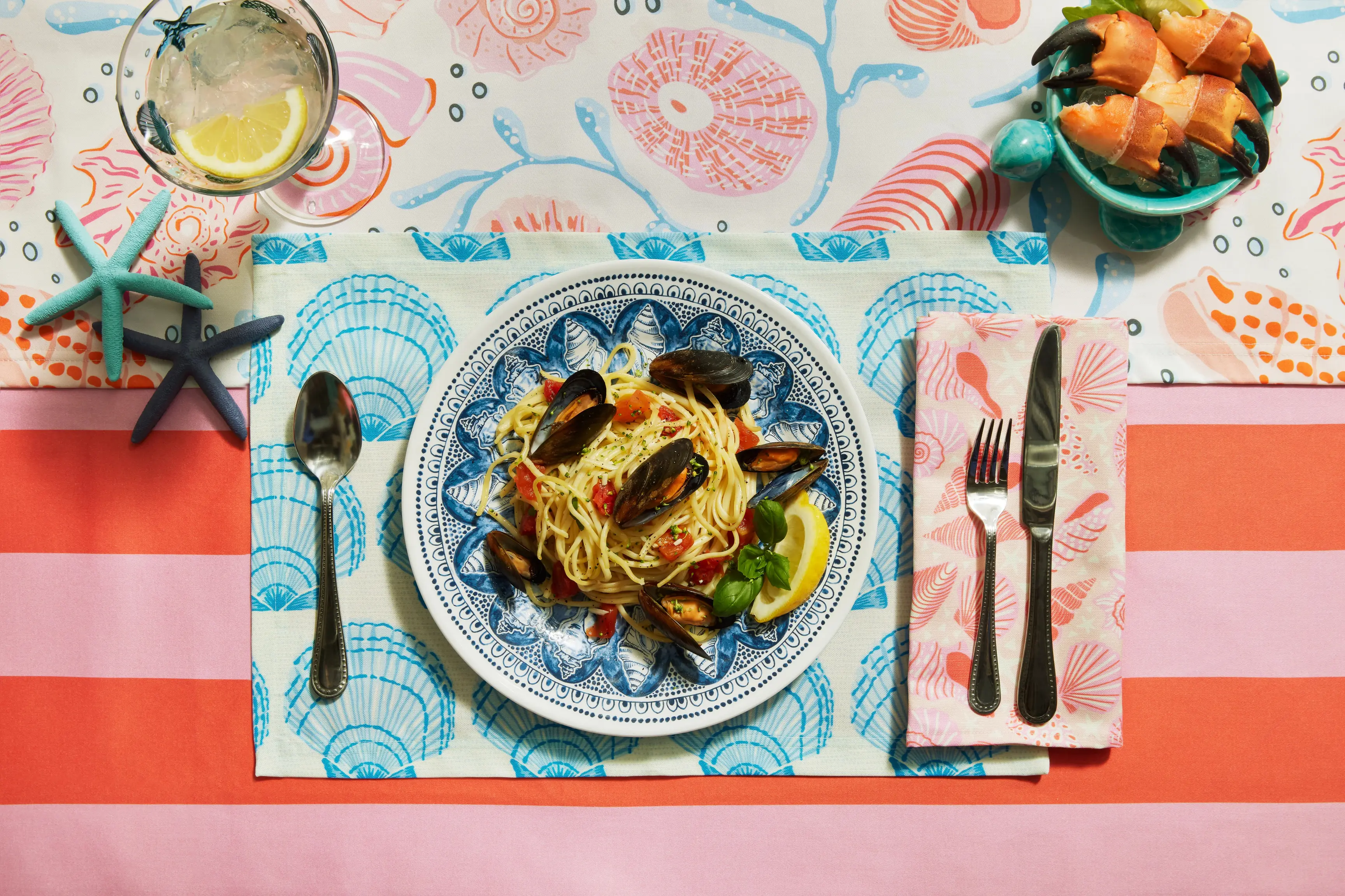 Blue and pick table linens on set table