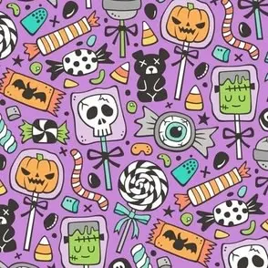 Halloween candy on purple