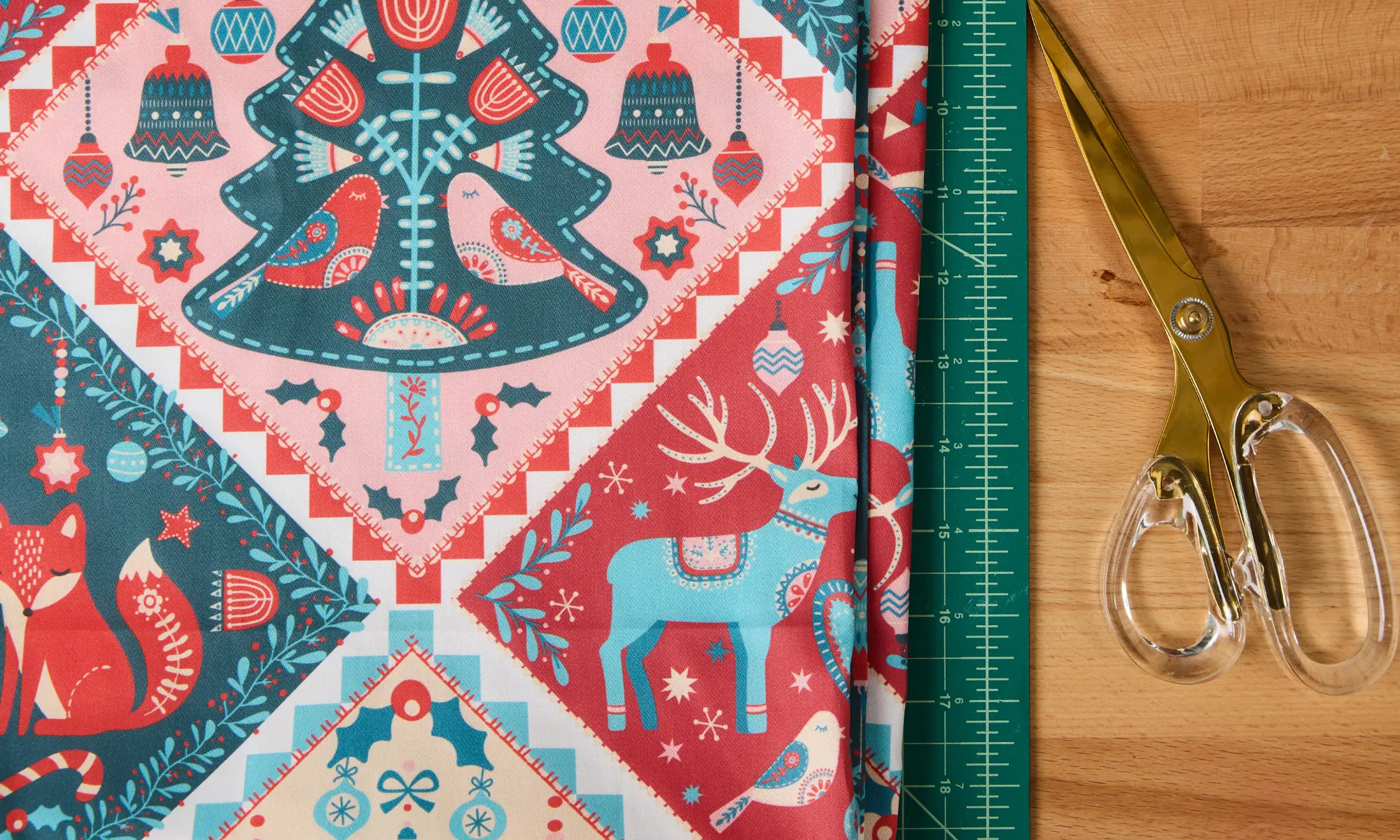 Fabric printed with the red and blue winter holiday cheater quilt