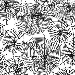 Black spiderweb design on white