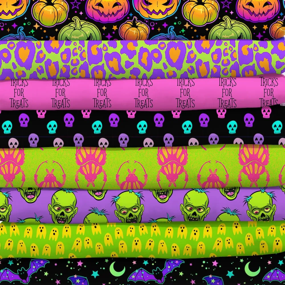 Stack of neon halloween fabrics